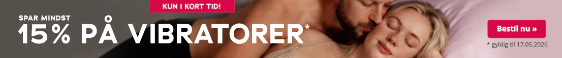 Et par ligger tæt sammen på en seng. Kvinden i beige undertøj holder en lilla vibrator, mens manden ligger bag hende og kysser hende på halsen. Til venstre står der: »Spar mindst 15% på vibratorer*. Gælder t.o.m. 17.05.2026«. Øverst er der en rød knap med teksten »Kun i kort tid!«.