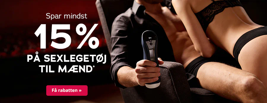En mand i underbukser og en opknappet skjorte sidder ved siden af en kvinde i sort undertøj, der læner sig let frem over ham. Manden holder en masturbator i hånden. Hvid tekst: »Spar mindst 15% på sexlegetøj til mænd*«. Nederst en rød knap: »Få rabatten »«.